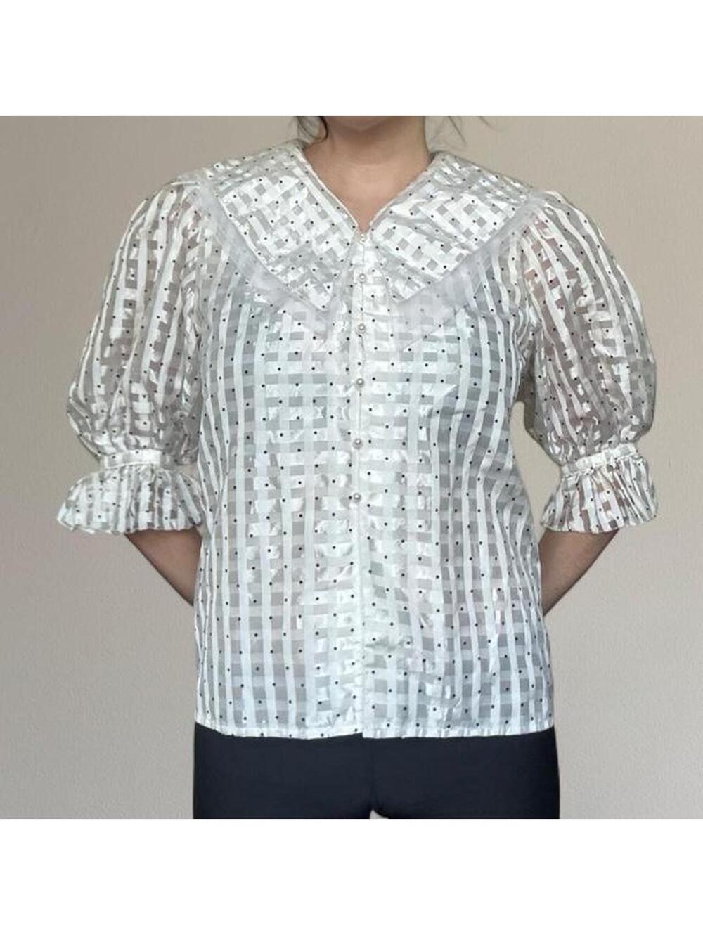 Puff sleeve button up blouse.